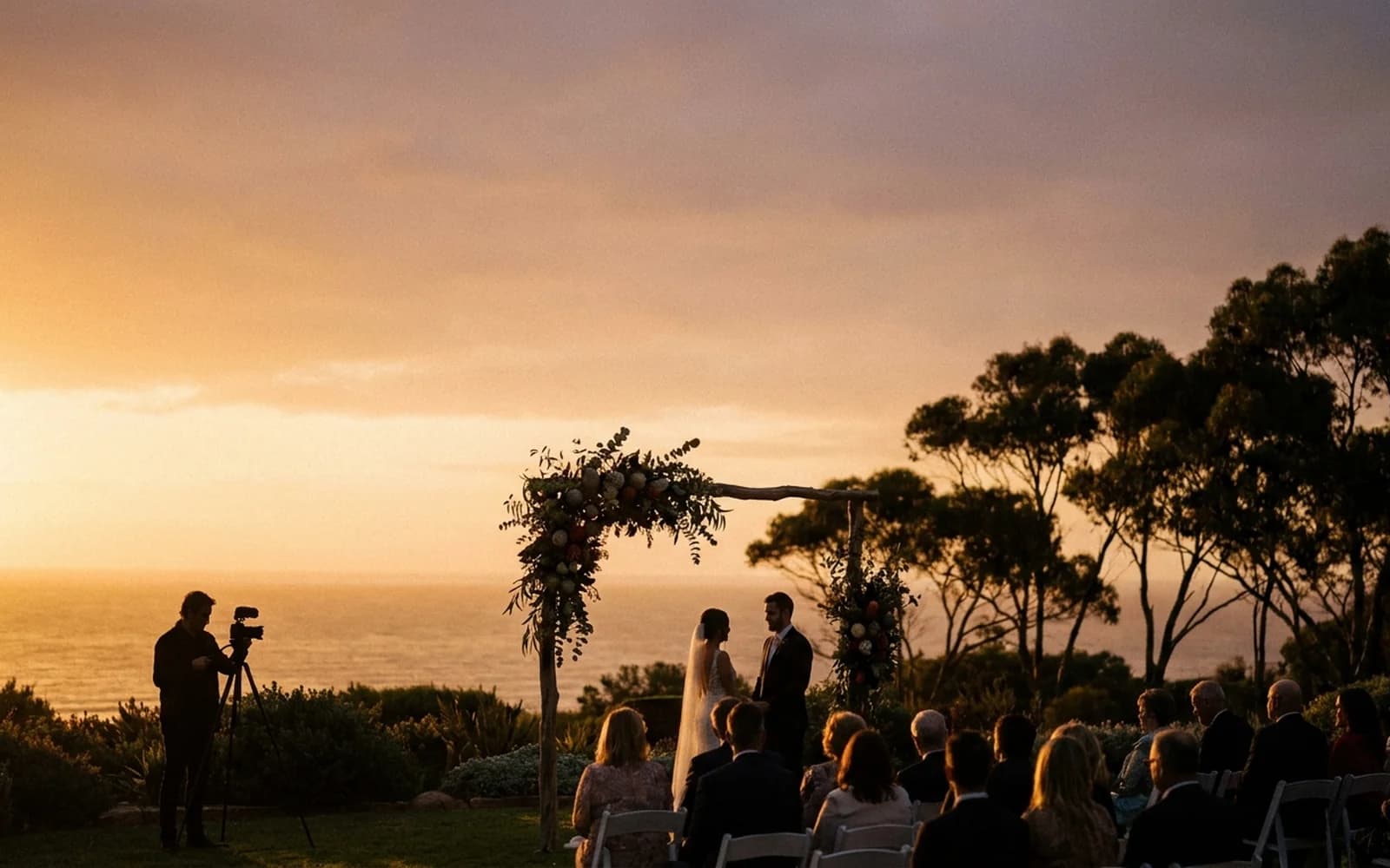 A wedding ceremony filmed from a distance at golden hour